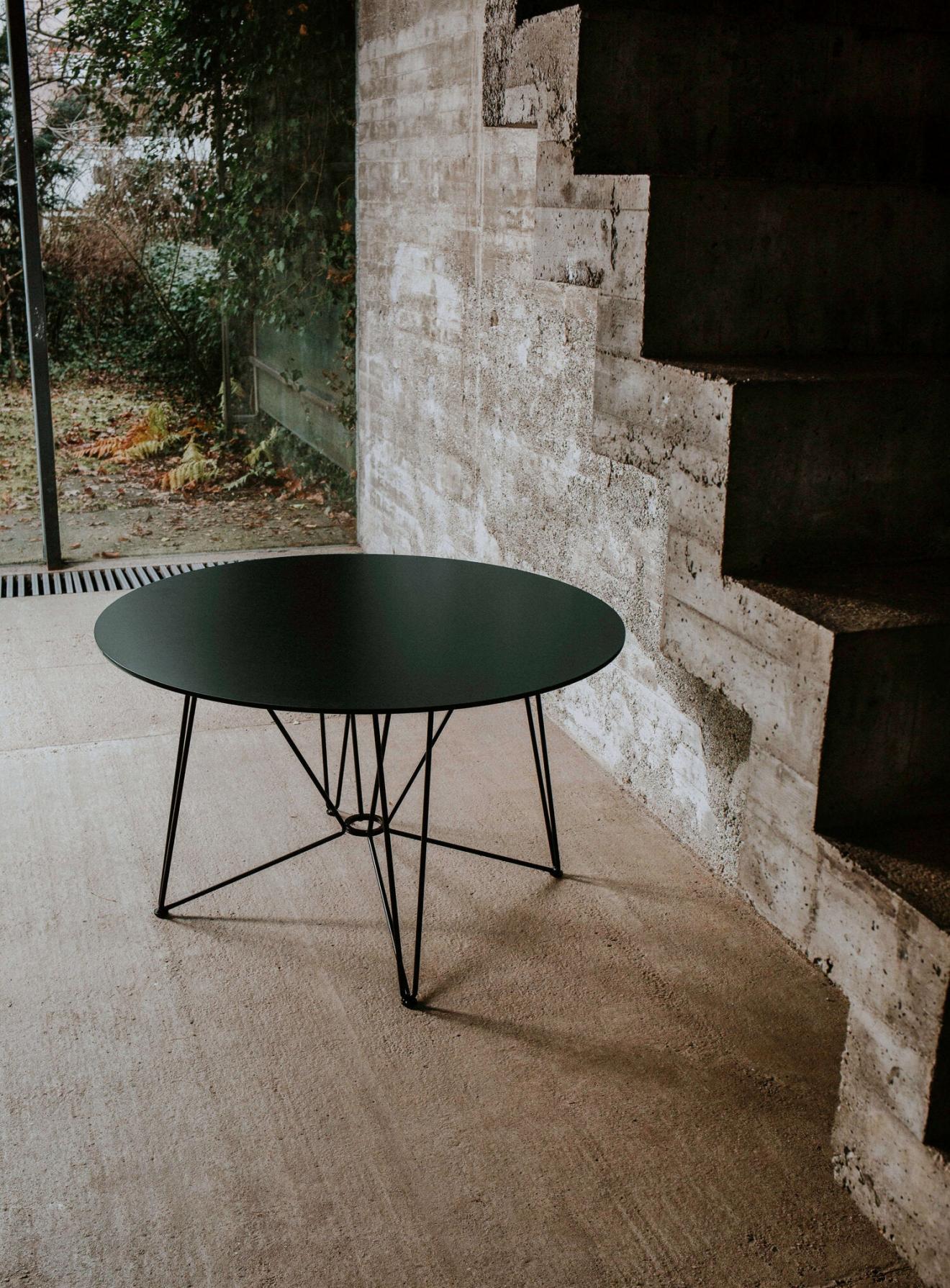 ring dining table by acapulco design
